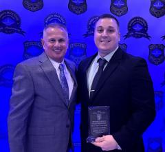 Chief Keith Banks and Officer of the Year Josh Kosiorowski at awards banquet