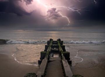 A photo of a storm over the beach